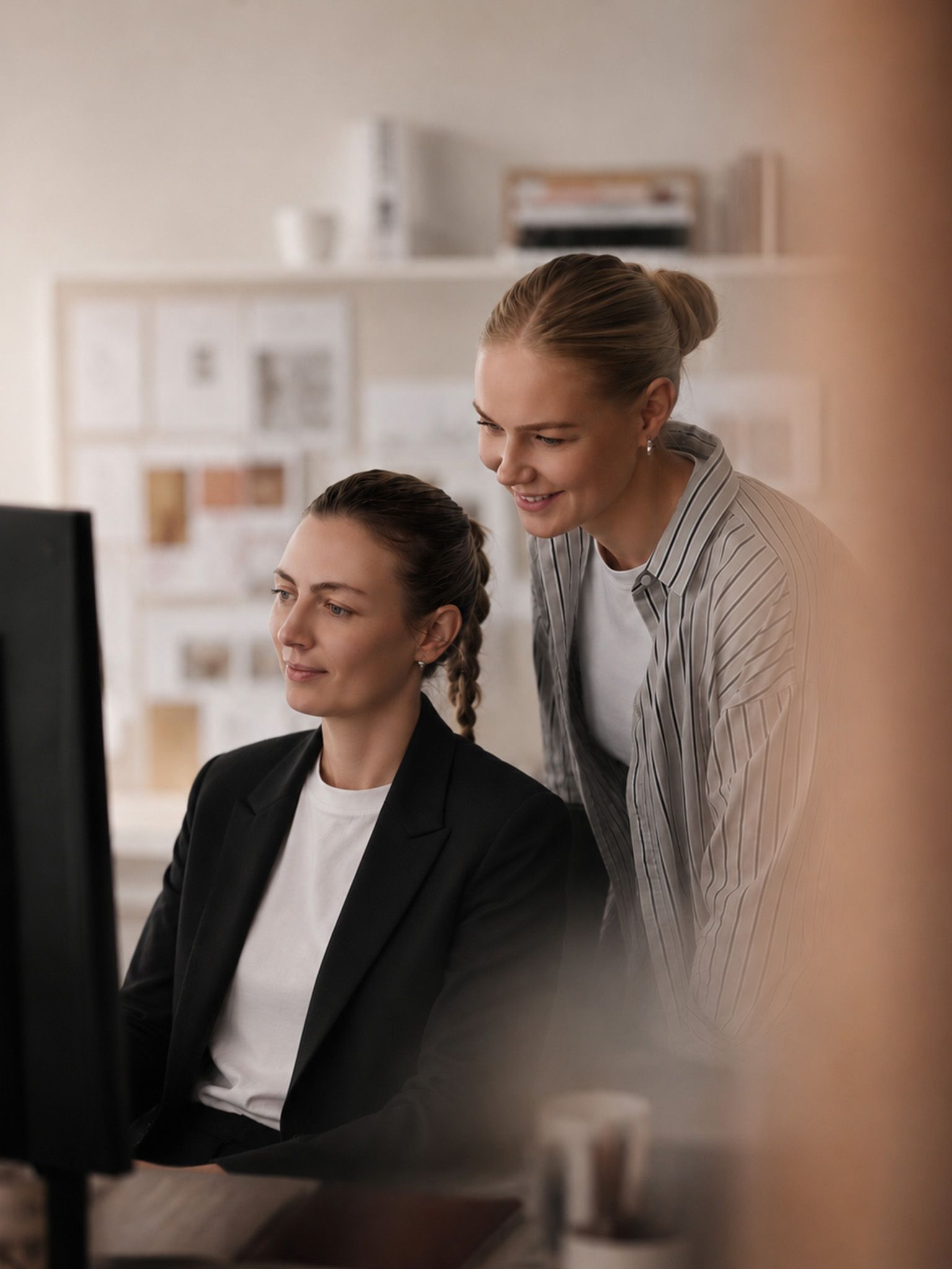 Nanna and Maria reviewing designs together